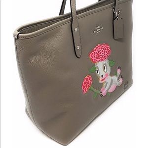 Super cute coach bag with puppy! BASEMAN X COACH